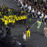 Usain Bolt bearing the Jamaican flag at the London 2012 Olympics